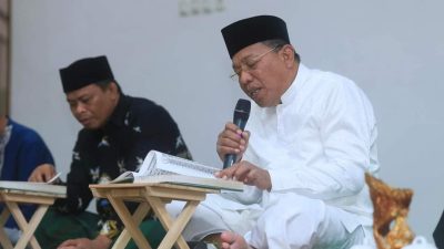 Caption: Bupati Depri Pontoh dan Wabup Amin Lasena menggelar tadarusan Al quran di rumah masing-masing. (IST) 