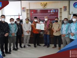 Wabup Resmi Serahkan Sertifikat Tanah untuk Pembangunan Kantor KPU Bolsel