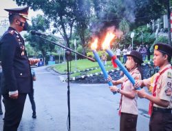 Kapolres Bitung Pimpin Upacara Taptu dan Pawai Obor