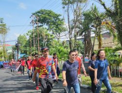 Jalan Sehat Kanwil Kemenkumham Sulut dan Bagikan Stiker, Semarakkan KTT G20