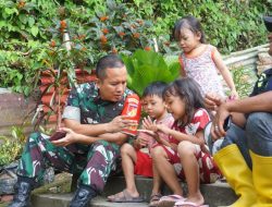 Dansatgas TMMD Kodim 1309/Manado Dekat dengan Anak-anak