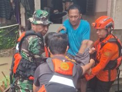 Kodim 1309/Manado dan Tim SAR Kompak Evakuasi Korban Banjir