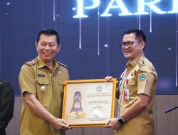 Kembali Cetak Prestasi, Bupati Joune Ganda Terima Paritrana Award 2024